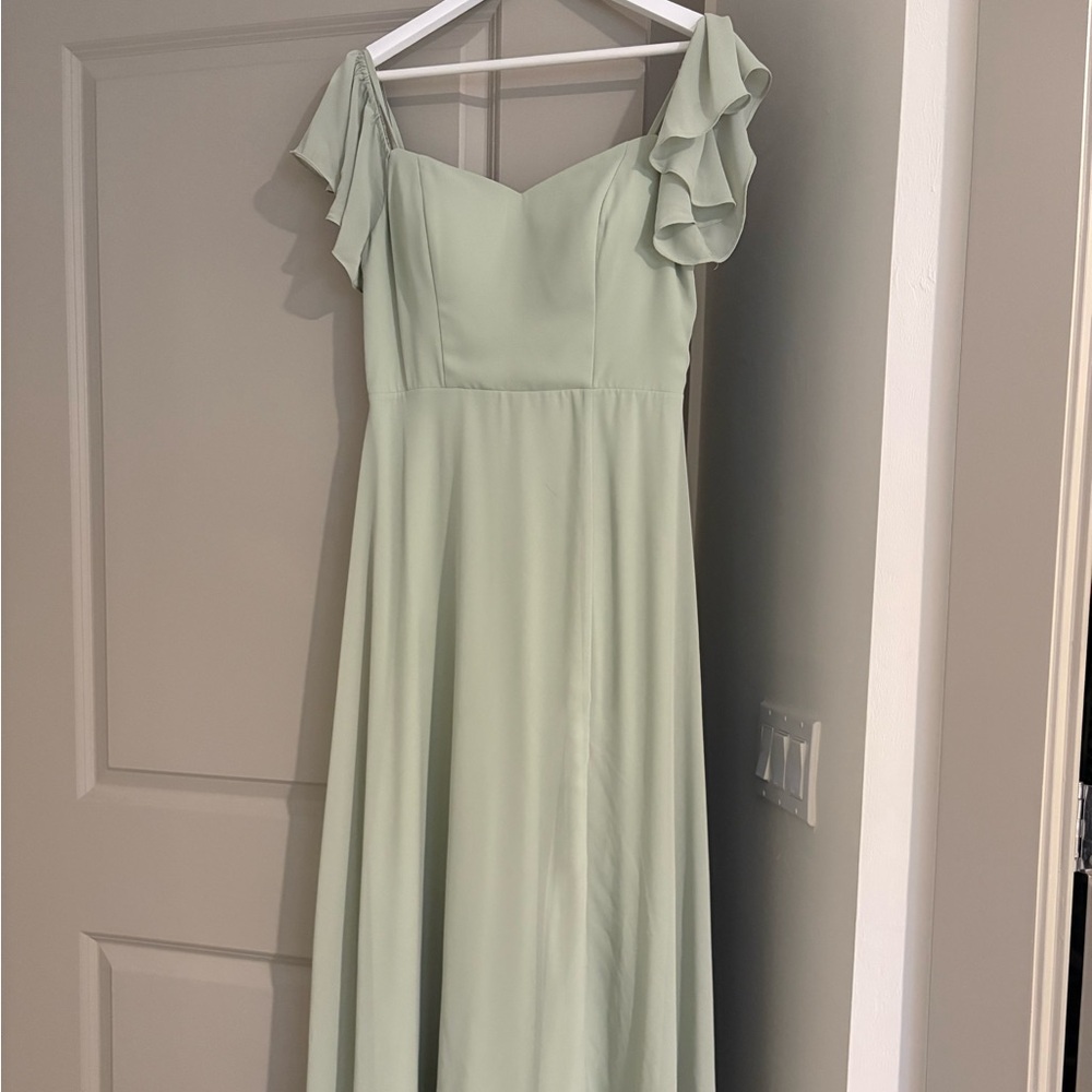 This sage green bridesmaid dress is size XL (US 10) and was only worn once. It’s